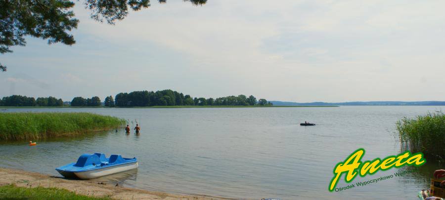 деревянные дачные домики база отдыха ночлеги на берегу озера в Польше Мазурские озера