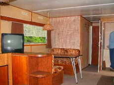 деревянные дачные домики база отдыха ночлеги на берегу озера в Польше Мазурские озера